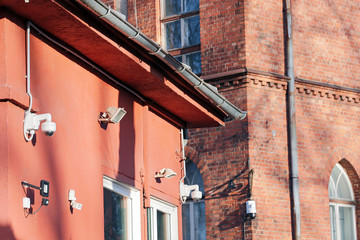 Surveillance cameras on the corner of building