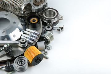 new car parts on white background with copy space