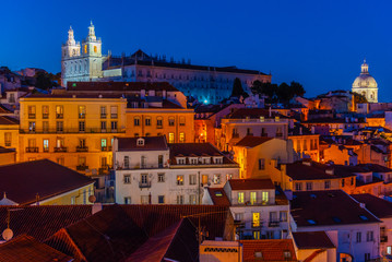 Sunset view of Alfama district and Church of São Vicente of Fora in Lisbon, Portugal