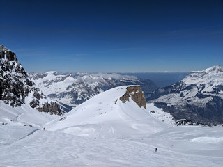 Fototapeta na wymiar scenic view of snow covered mountains against sky
