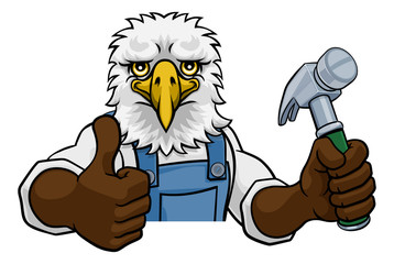 An eagle cartoon animal mascot carpenter or handyman builder construction maintenance contractor peeking around a sign holding a hammer and giving a thumbs up