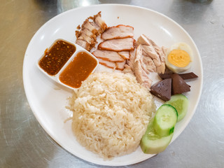Hainanese Chicken Rice with sauce.