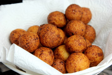 Cottage cheese balls. Small balls of freshly baked homemade cottage cheese fried hot oil. Freshly made donuts from cottage cheese