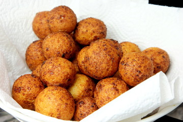 Cottage cheese balls. Small balls of freshly baked homemade cottage cheese fried hot oil. Freshly made donuts from cottage cheese