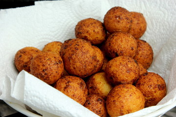 Cottage cheese balls. Small balls of freshly baked homemade cottage cheese fried hot oil. Freshly made donuts from cottage cheese