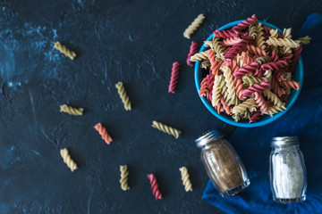  vegetarian pasta on a dark classic blue background copy space