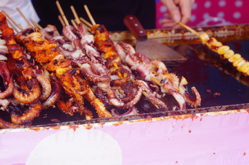 Barbecued foods include kebabs and quail eggs