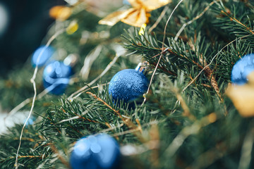 photo of blue christmas balls at spruce, Color of the year 2020