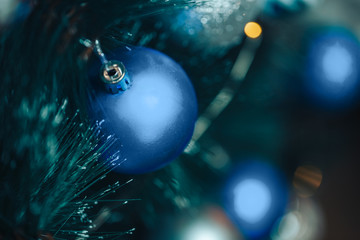 photo of blue christmas balls at spruce, Color of the year 2020