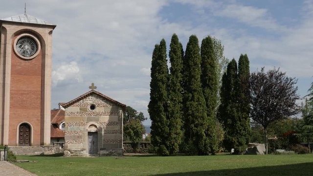 Zica monastery bell tower and gardens 4K panning footage