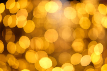 Gold blur abstract background. bokeh christmas blurred beautiful shiny Christmas lights, Christmas background concept..