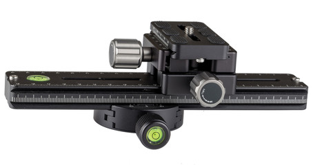 Obraz premium Macro rails sites that can be used to shoot panoramas and rotate the camera around a nodal point, on a white background.