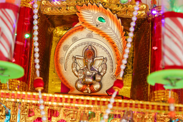 Fototapeta premium Dry coconut and lord Ganesha sculpture 