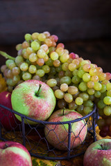 Fresh autumn apples and grapes