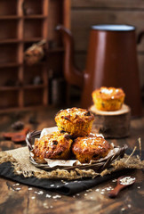 Fresh homemade delicious apple and carrot muffins with dried fruits and nuts
