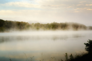 Obraz na płótnie Canvas Misty morning on Uby lake, France