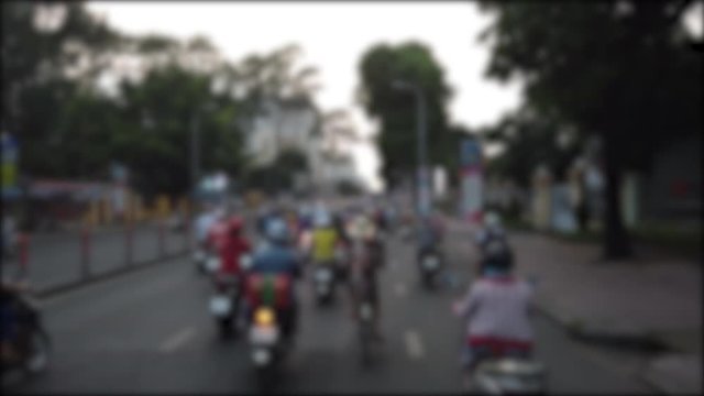 Blurred footage of traffic transport in Ho Chi Minh, Vietnam. Royalty high-quality free stock footage of slow moving traffic with lots of motorbike, car... transport on the road in Ho Chi Minh city