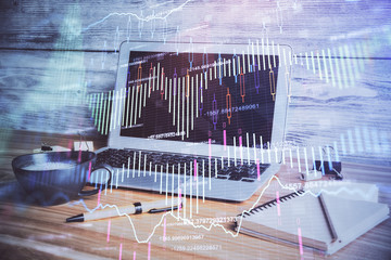 Multi exposure of forex graph and work space with computer. Concept of international online trading.