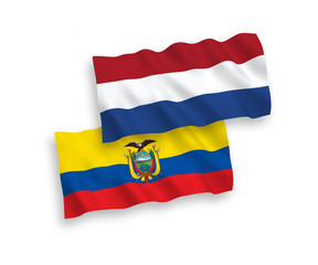 National vector fabric wave flags of Ecuador and Netherlands isolated on white background. 1 to 2 proportion.