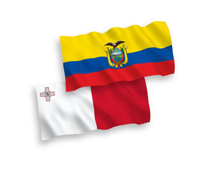 National vector fabric wave flags of Malta and Ecuador isolated on white background. 1 to 2 proportion.