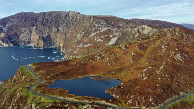 Aerial of Slieve League Cliffs are among the highest sea cliffs in Europe rising 1972 feet or 601 meters above the Atlantic Ocean - County Donegal, Ireland
