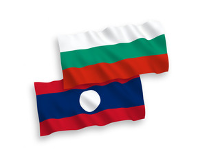 National vector fabric wave flags of Bulgaria and Laos isolated on white background. 1 to 2 proportion.