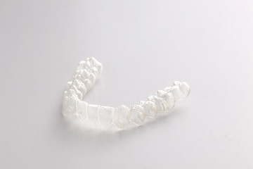 transparent teeth brace aligenr isolated on white background with copy space foryour space,