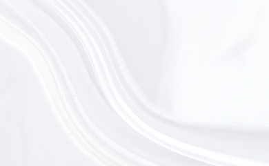 White gray satin texture that is white silver fabric silk background with beautiful soft blur pattern natural.