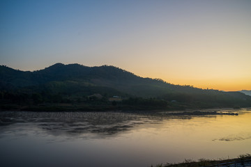Naklejka na ściany i meble sunset on khong river