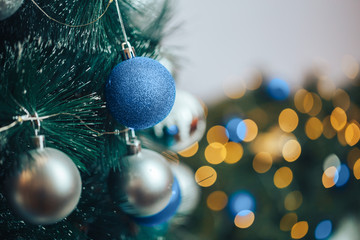 photo of blue christmas balls at spruce, Color of the year 2020