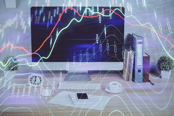 Forex graph hologram on table with computer background. Double exposure. Concept of financial markets.