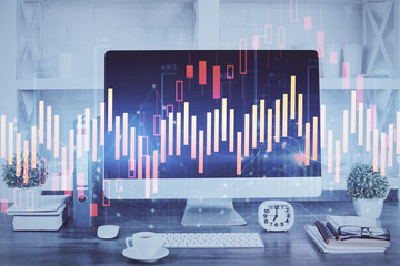 Forex graph hologram on table with computer background. Double exposure. Concept of financial markets.
