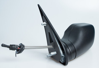 London, England Peugeot 106 1998 left near side wing mirror for cars. Shot on isolated white background with smooth gradient. Car part with adjustable cable, aerodynamics designed for 90's automobile