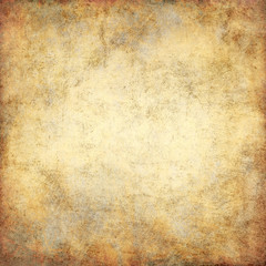 Brown faded old paper texture with a nice patina.Vintage rustic grunge background.