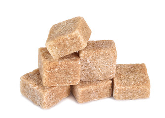 pieces of cane sugar isolate on white