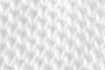 The texture of the knitted fabric is white. Binds the knitting needlework.