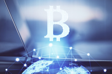 Multi exposure of blockchain theme hologram and table with computer background. Concept of bitcoin...