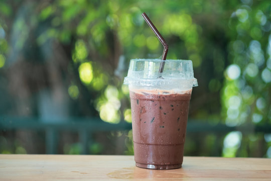Iced chocolate in disposable plastic glass