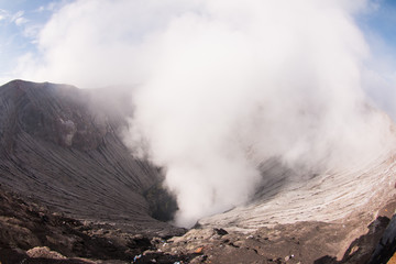 Volcano Bromo at sunset time background near Cemoro lawang village at mount Bromo in Bromo tengger semeru national park, East Java, Indonesia.