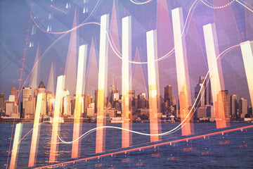 Forex chart on cityscape with skyscrapers wallpaper multi exposure. Financial research concept.