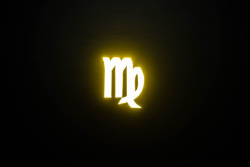 yellow illuminated Virgo zodiac sign on black background