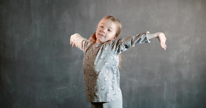 Little girl yawns, shows that she wants to sleep really, wants to go to bed.