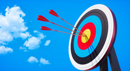 Colored target board with arrows in the sun against blue sky with small clouds - 3D illustration