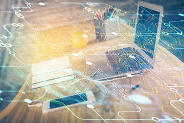 Technology theme drawing and table with computer. Double exposure. Concept of information.