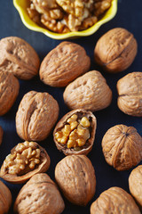 walnuts on black stone surface