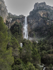Obraz premium The waterfall of La Osera with its 130 meters is the highest in Andalusia. It is located on the Aguascebas Chico River, within the Natural Park of the Sierra de Cazorla, Segura and Las Villas, Jaén.