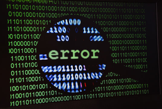Computer error failure concept,  failure message on screen, bad software pc app crash, email malware, data loss and recovery, rear view over the shoulder Business laptop or office notebook computer PC