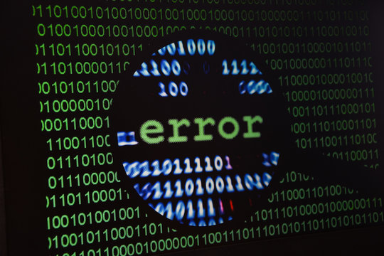 Computer error failure concept,  failure message on screen, bad software pc app crash, email malware, data loss and recovery, rear view over the shoulder Business laptop or office notebook computer PC