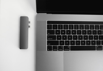 The USB adapter under the Type-C connector for laptop. Multiport station for laptop with multiple...
