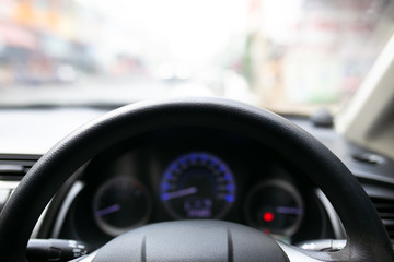 Car component, turn signal, brake light, headlight, speedometer, steering wheel.